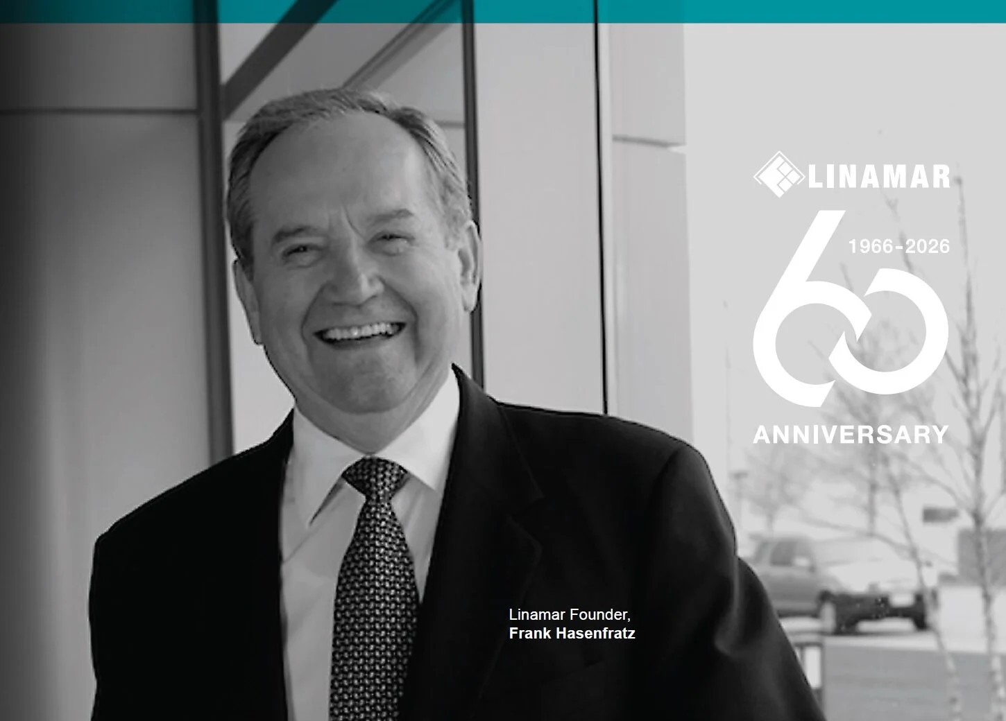 Black and white photo of a smiling man in a suit and tie standing indoors, with the text "Liramar 65 Anniversary" and "Liramar Founder Frank Menardini" visible.