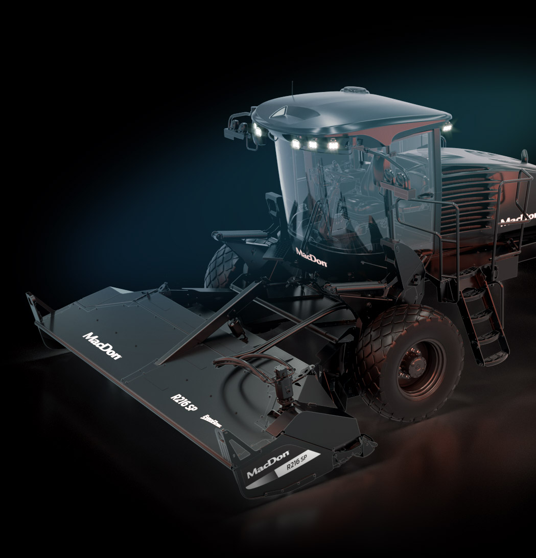 Modern large agricultural harvester with wide cutting header and enclosed cab, shown on a dark background.